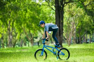 Accent Eye Care your-boy-performing-trick-on-bicycle-outdoors-PTGAKUV  