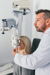 Accent Eye Care doctor-examining-his-patients-sight-7YQ2VU6  